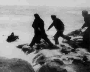 Crewman being pulled ashore